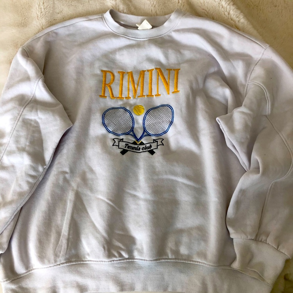 White tennis crew neck sweatshirt.